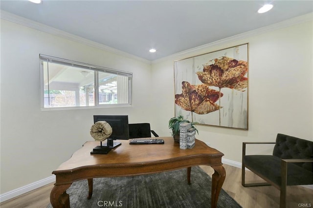 office area with crown molding and hardwood / wood-style flooring