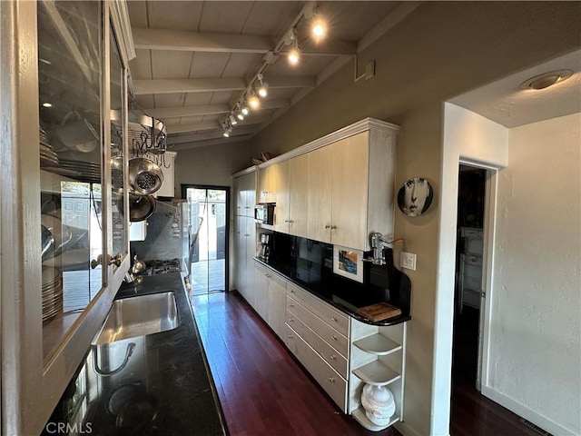 kitchen featuring wood ceiling, dark wood-type flooring, sink, light brown cabinets, and vaulted ceiling with beams