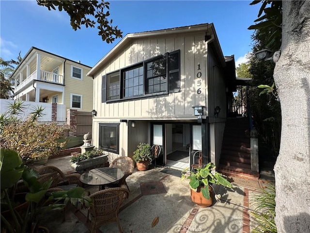 back of house featuring a patio area