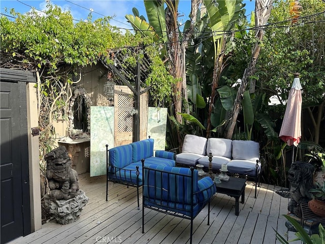 deck featuring an outdoor hangout area