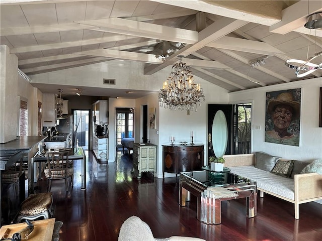 living room with a chandelier, hardwood / wood-style floors, and vaulted ceiling with beams