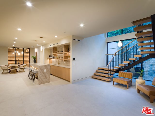 living room featuring sink