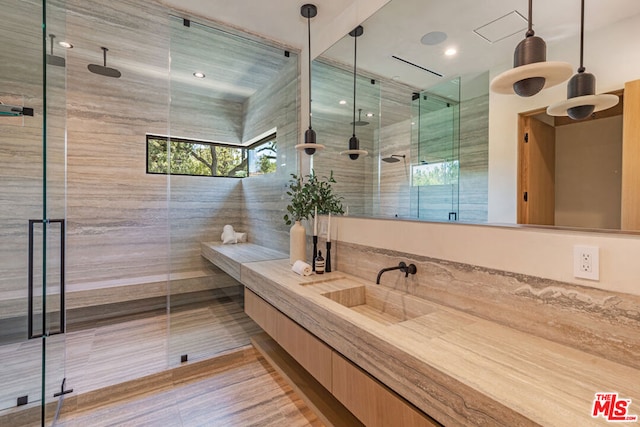 bathroom with vanity and walk in shower