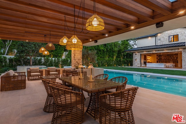 view of swimming pool featuring outdoor lounge area and a patio area