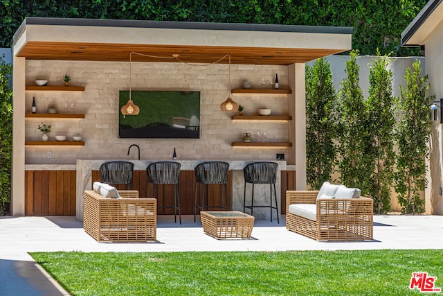 view of patio / terrace with an outdoor bar