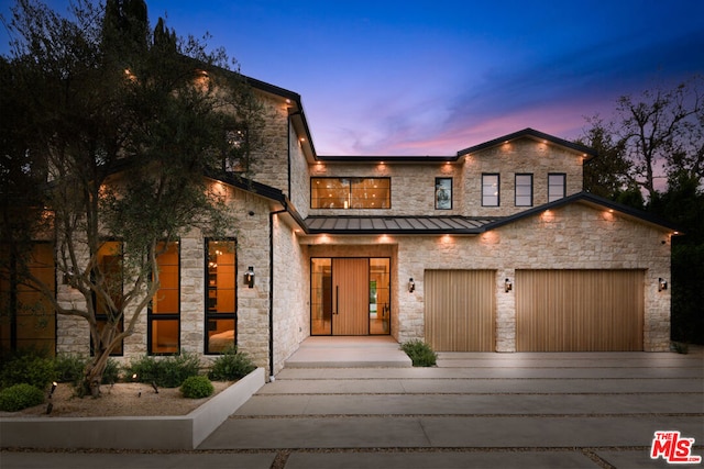 modern home featuring a garage