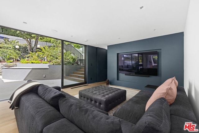 living room with light hardwood / wood-style floors