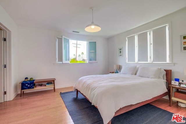 bedroom featuring hardwood / wood-style floors