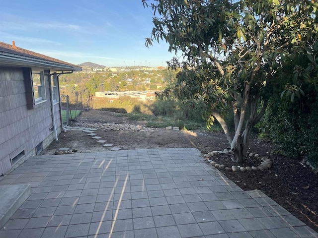 view of patio / terrace with a mountain view