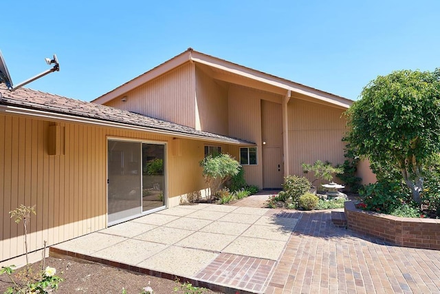 rear view of property with a patio