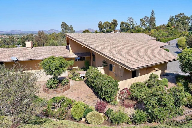 birds eye view of property with a mountain view