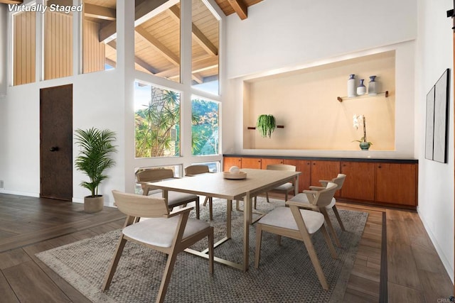 dining space with beam ceiling, high vaulted ceiling, and dark wood-type flooring