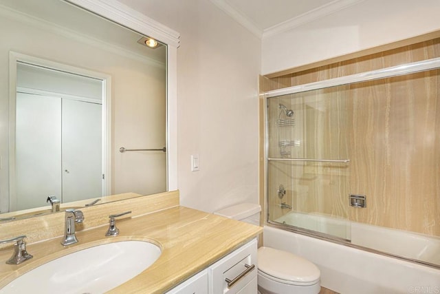 full bathroom featuring shower / bath combination with glass door, vanity, ornamental molding, and toilet