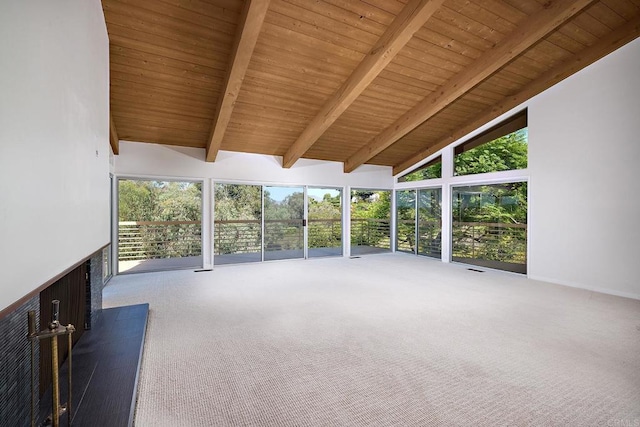 unfurnished sunroom with vaulted ceiling with beams and wooden ceiling