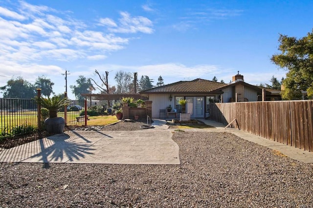 rear view of property with a patio