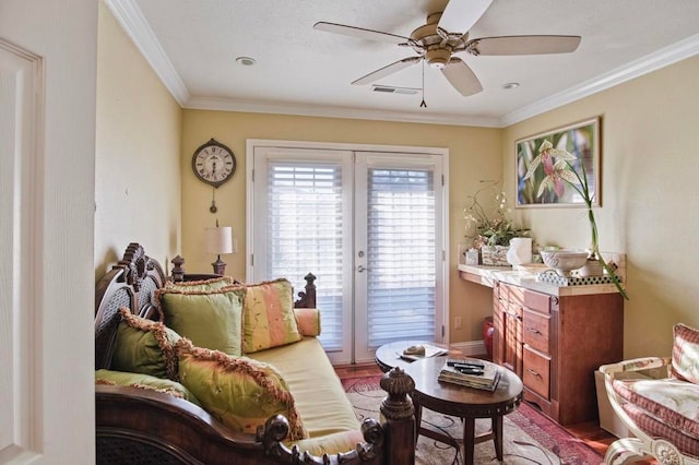 living room with wood-type flooring, french doors, ornamental molding, and ceiling fan