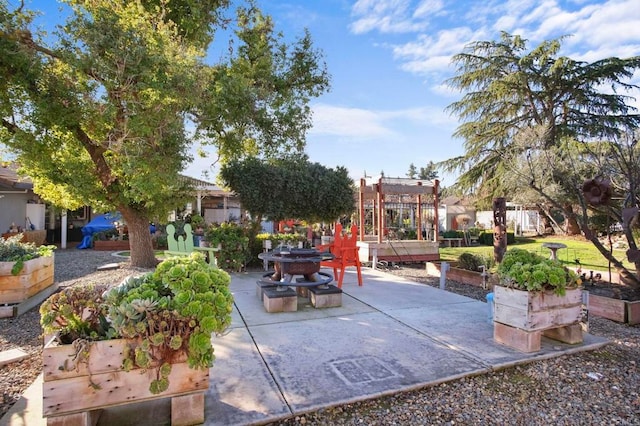 view of patio with a playground