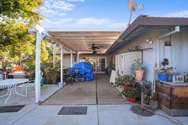 view of patio / terrace featuring a pergola and ceiling fan