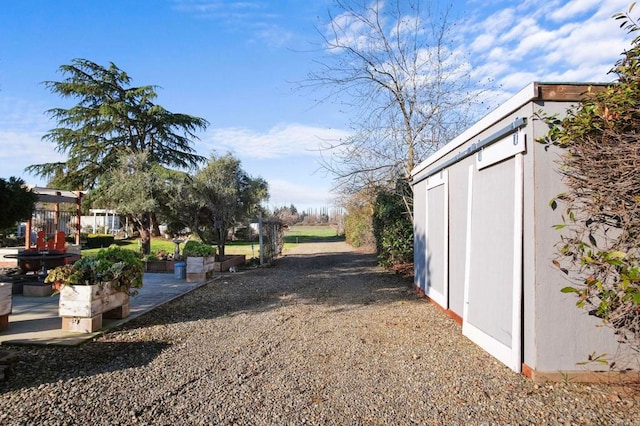 view of yard with a shed