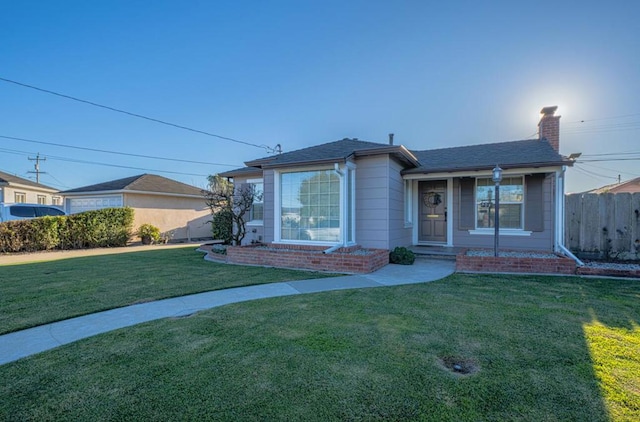 view of front facade with a front yard