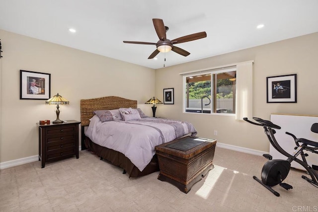 bedroom with light colored carpet and ceiling fan