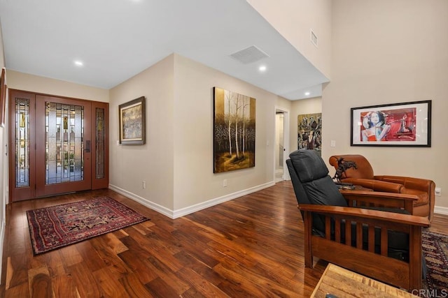 foyer featuring dark hardwood / wood-style floors