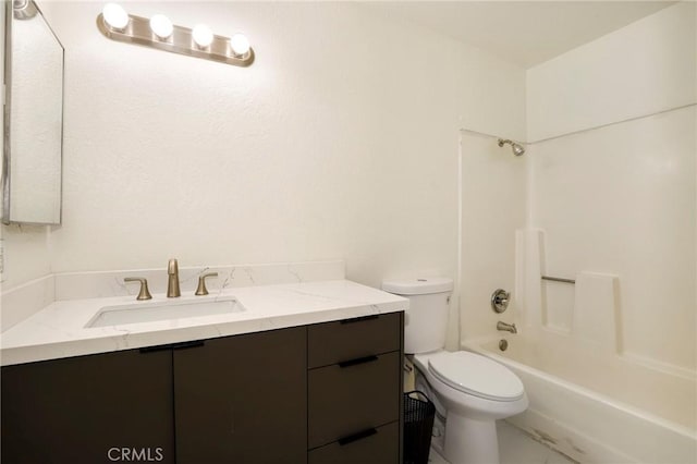 full bathroom featuring toilet,  shower combination, and vanity