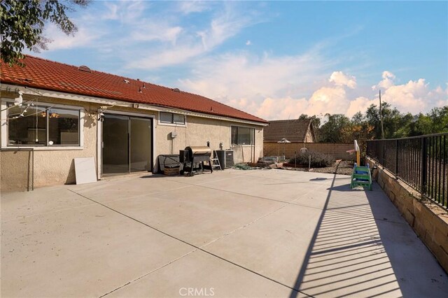 rear view of house with a patio area