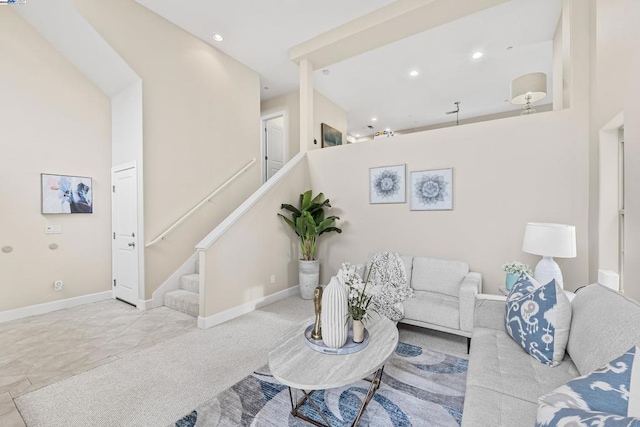 living room with a towering ceiling