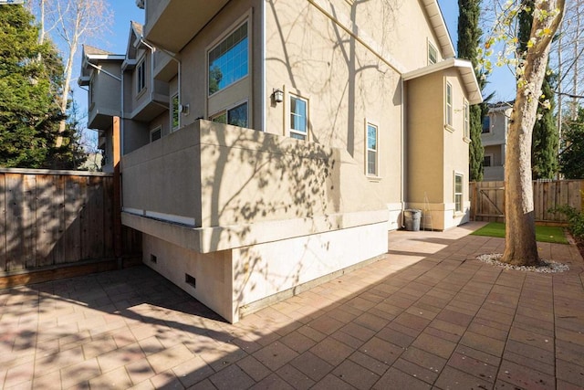 view of home's exterior featuring a patio area