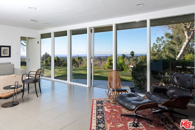 sunroom with plenty of natural light