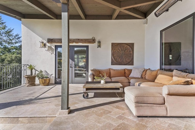 view of patio / terrace with an outdoor living space and french doors