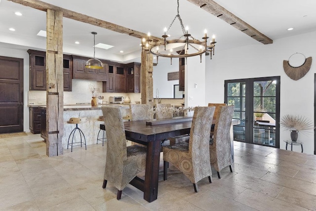 dining room featuring french doors, beamed ceiling, and a notable chandelier