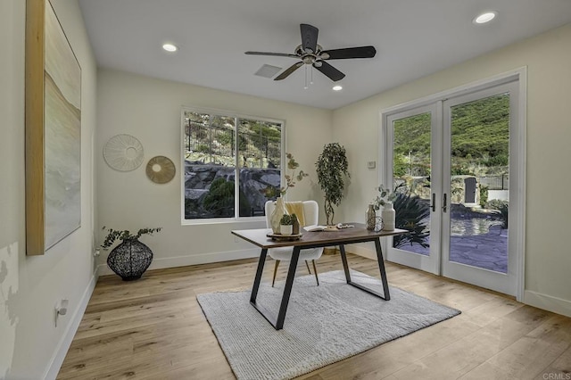 office space featuring plenty of natural light, recessed lighting, and light wood finished floors