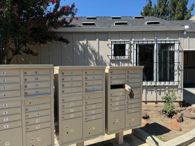 view of community with a mail area