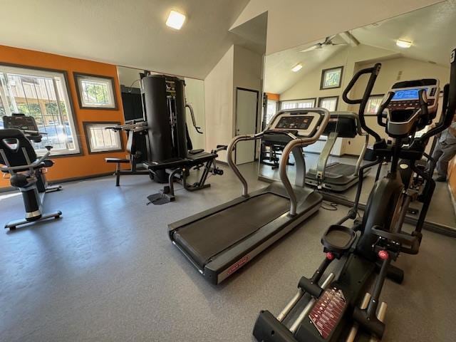 workout area with ceiling fan and lofted ceiling