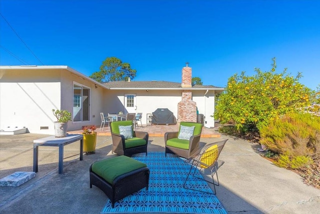 view of patio / terrace featuring a grill