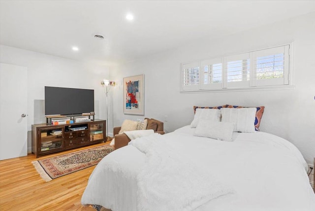 bedroom featuring hardwood / wood-style flooring