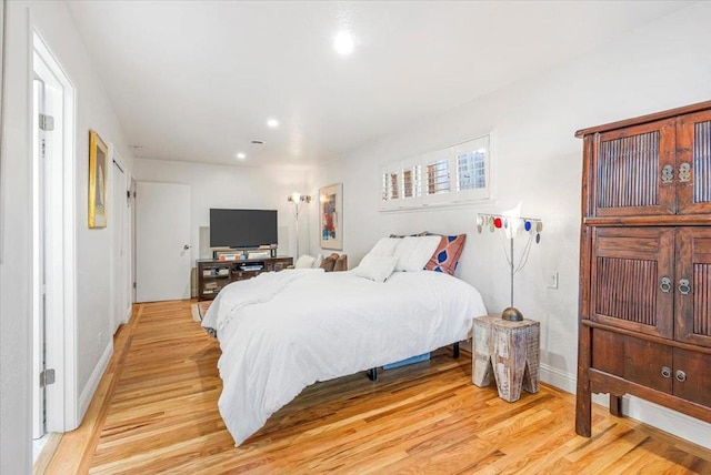 bedroom featuring light wood-type flooring