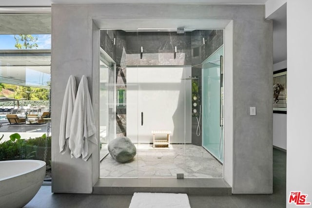 bathroom featuring plus walk in shower