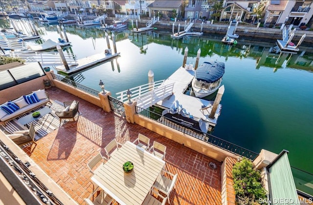 dock area with a water view