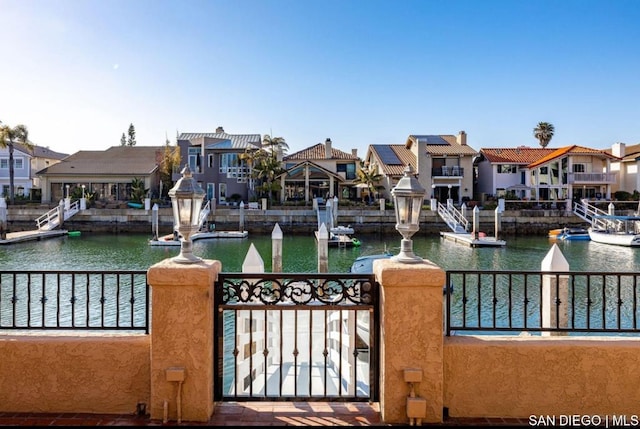 dock area with a water view