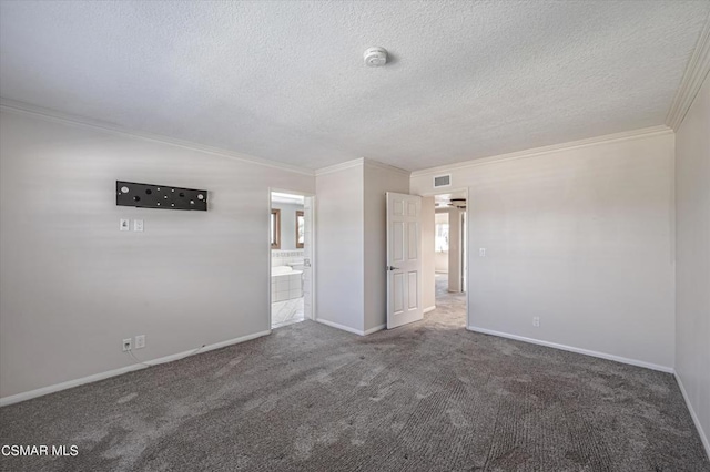 carpeted empty room with a textured ceiling and crown molding