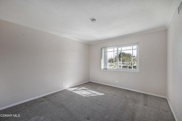 unfurnished room with a textured ceiling, ornamental molding, and carpet flooring