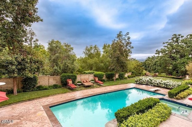 view of pool with a patio