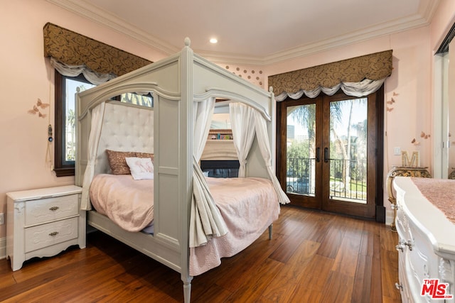 bedroom featuring access to exterior, french doors, dark hardwood / wood-style floors, and ornamental molding