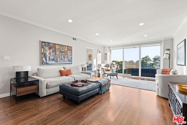 living room featuring ornamental molding and hardwood / wood-style floors