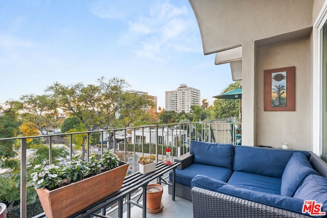 balcony with outdoor lounge area