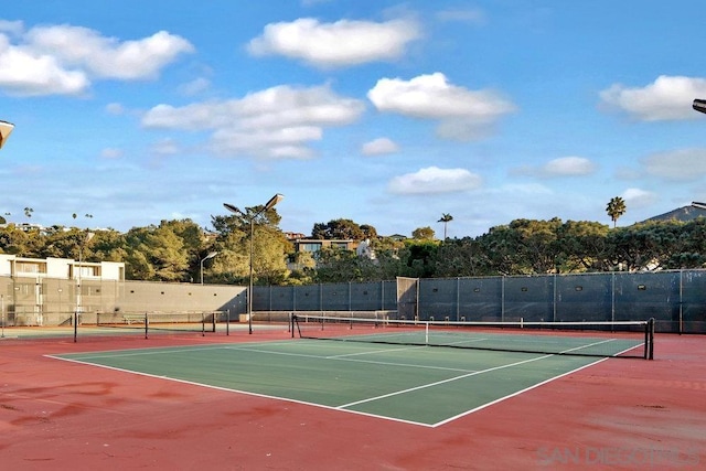 view of tennis court with basketball court