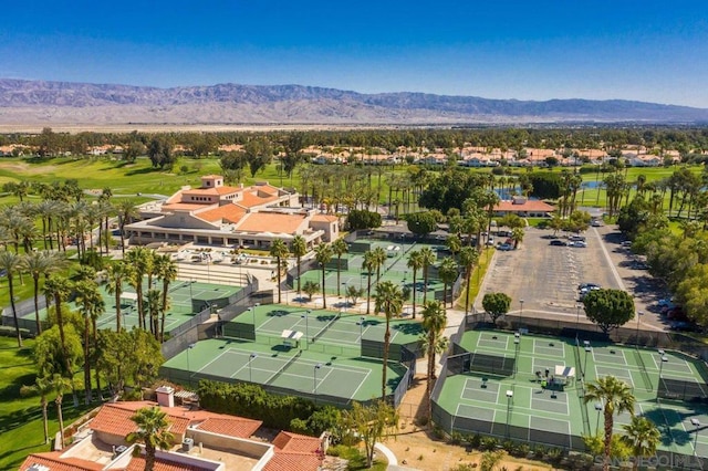 birds eye view of property featuring a mountain view